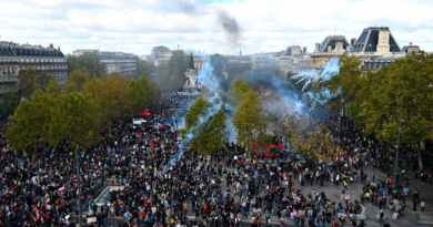 Demonstrators gather in Paris during violent protests across France in October 2026.