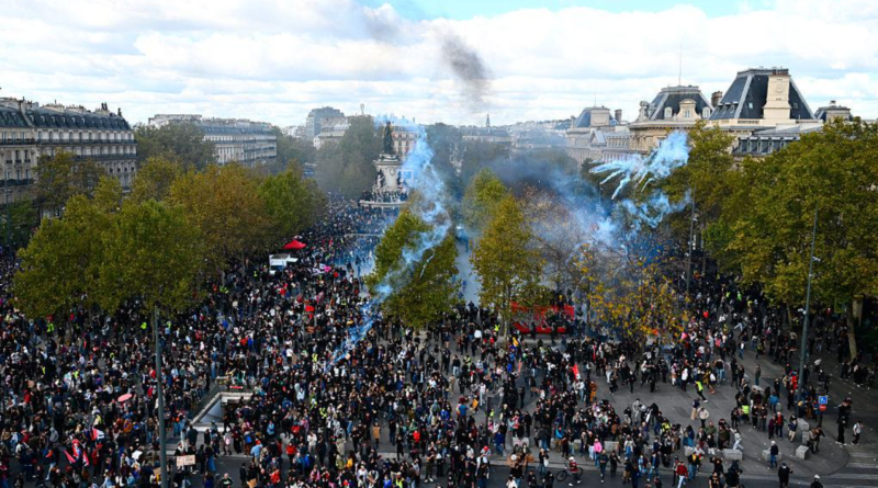 Demonstrators gather in Paris during violent protests across France in October 2026.